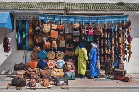 Berber men shopping, Essaouira, formerly Mogador, UNESCO World Heritage Site, Morocco, Africa