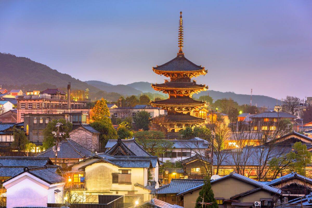 Yasaka Pagoda glowing over Kyoto’s Higashiyama old town at dusk